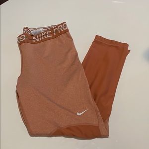 Peach Nike mesh leggings